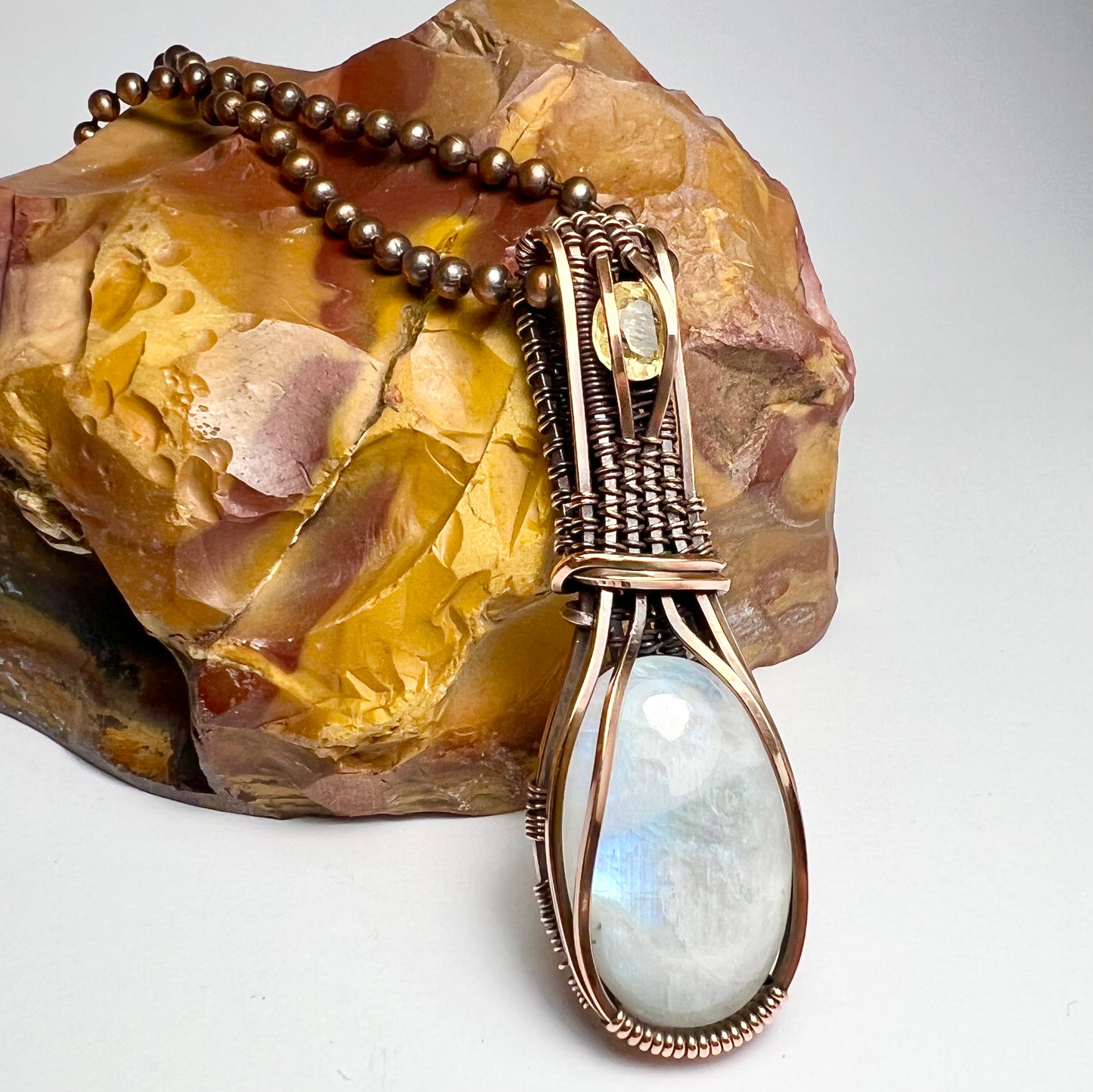 Rainbow Moonstone and Topaz wrapped with Copper Wire